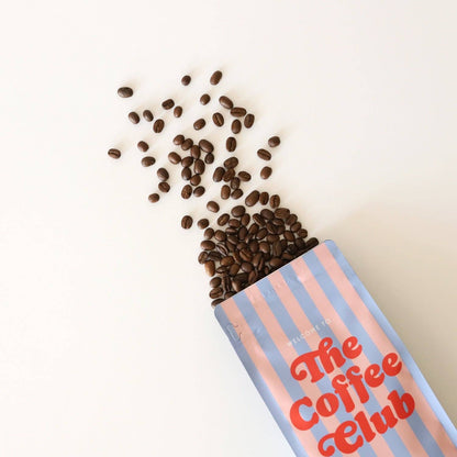 Bundle Tasse & Kaffee „The Coffee Club“ – Gestreift, ganze Bohne, 250 g